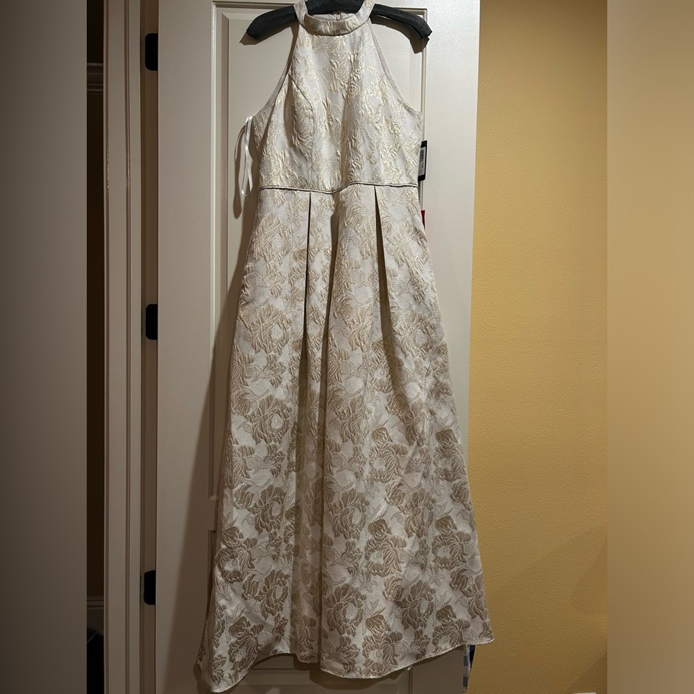 Stunning gold and white brocade design ball gown